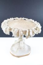 Early 20th century alabaster pedestal bird bath with carved foliate decoration, approx 29cm high (
