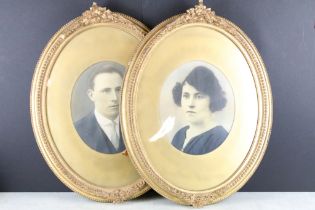 Pair of portraits of a man and a woman, in ornate oval gilt frames, overall 61 x 47cm