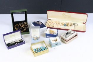 A small collection of vintage and contemporary costume jewellery to include silver examples.