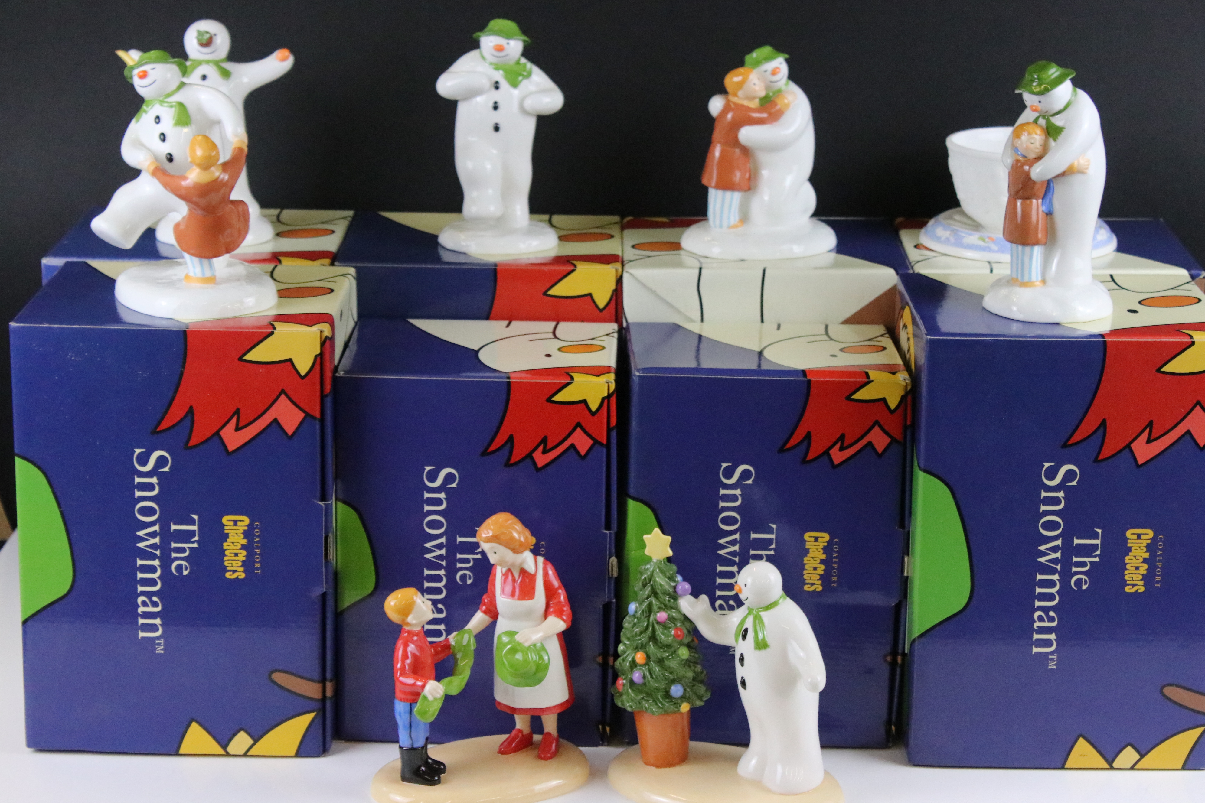 Group of Coalport Characters ' The Snowman' figurines to include Lithoplane, Dancing at the Party,