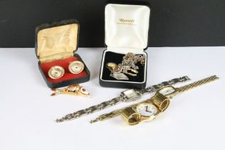 A small collection of wristwatches and costume jewellery.