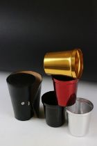 Harlequin set of Four Stacking Metal Stirrup Cups contained in a black real hide leather case,
