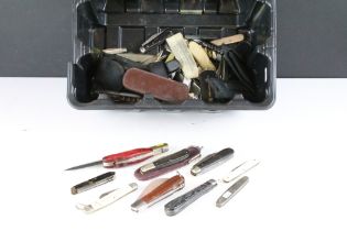 A large collection of penknives to include advertising examples together with multi-tools.