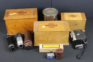 A collection of photographic developing equipment to include tanks, lenses ...etc..