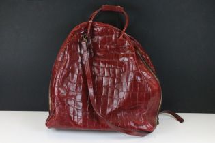 Mulberry 'antique' leathers domed weekend holdall bag in maroon alligator embossed leather. The