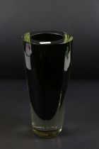 Mid Century cased art glass vase having a black interior and faceted sides. Unsigned. Measures