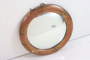 Arts and Crafts Copper Round Framed Convex Mirror with strapwork decoration, 46cm diameter