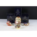 Four Royal Crown Derby gold stopper paperweights to include a large owl, bluetit, chaffinch and