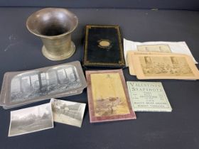 A small group of mixed collectables to include stereoscope slides, brass mortar, sandwich box....