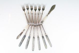 A set of six knives and forks with hallmarked sterling silver handles.