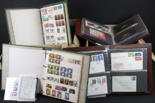 Collection of stamps across two boxes to include assorted loose first day covers, presentation