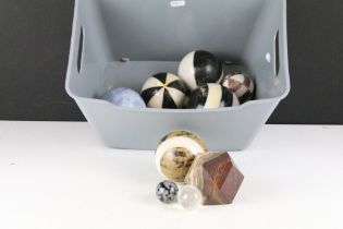 A collection of polished semi precious stone ornaments.