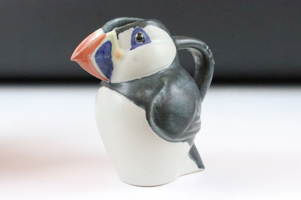 Three graduating John O'Groats pottery puffin jugs. Each moulded into the form of a puffin with hand - Image 7 of 12