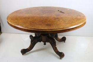 Victorian Burr Walnut Oval Tilt Top Breakfast Table raised on turned bulbous pillar with four carved