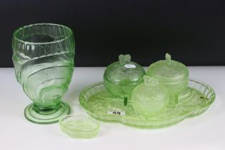 Art Deco uranium green pressed glass dressing table set, together with a pressed glass vase. Vase