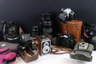 Collection of cameras and related equipment to include a Pentax ME super camera with a 35-70mm lens,