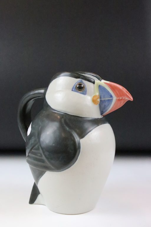 Three graduating John O'Groats pottery puffin jugs. Each moulded into the form of a puffin with hand - Image 2 of 12