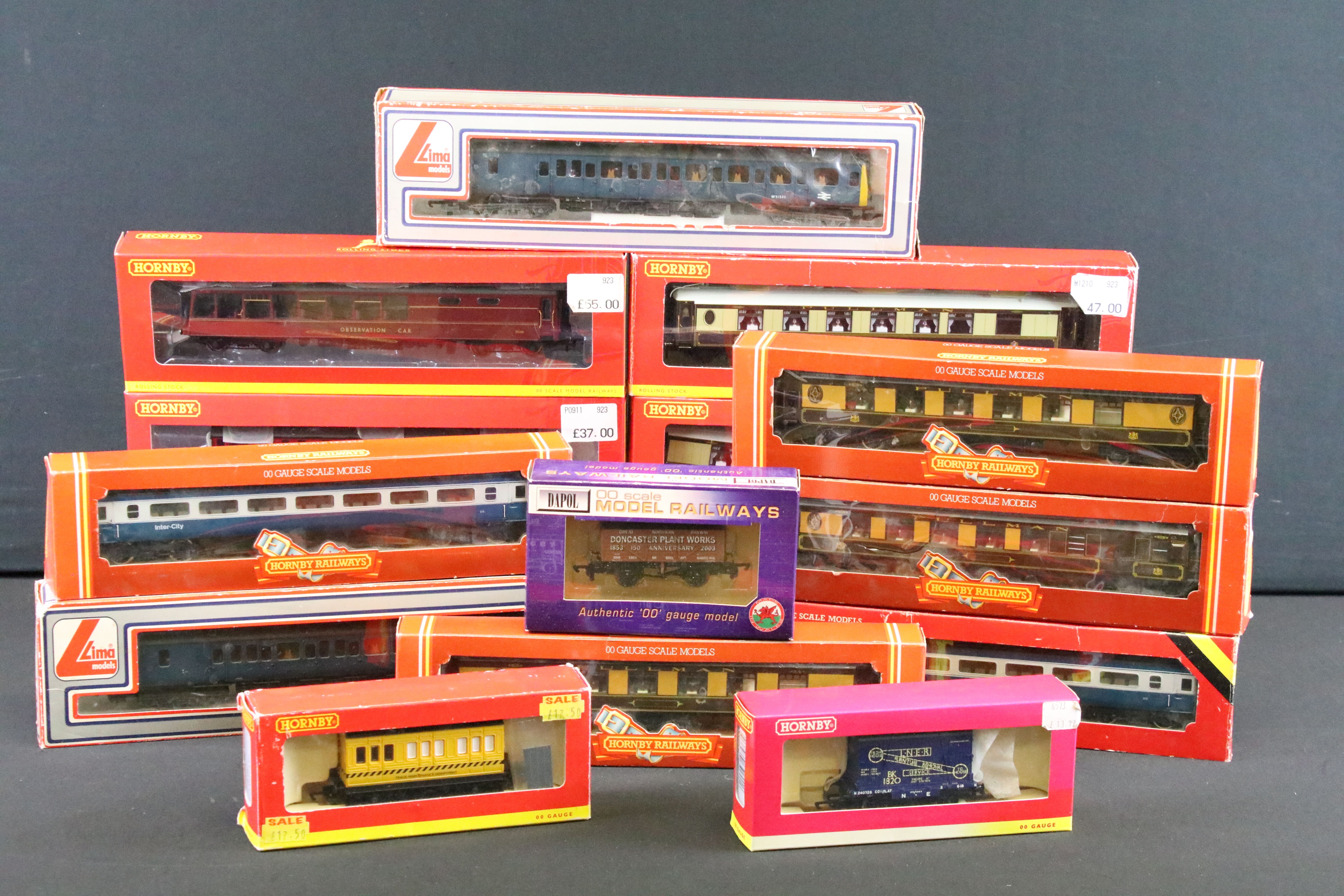 15 Boxed OO gauge items of rolling stock to include 13 x Hornby featuring R4519, R4520, R4521,