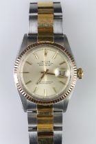 Rolex Oyster Perpetual Datejust automatic wrist watch. The watch having a champagne dial with gilt