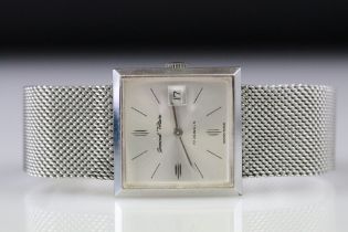 Germinal Voltaire stainless steel wristwatch, date aperture, square silvered dial, baton numeral