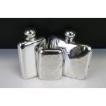 Two silver hallmarked hip flasks both with hinged lids (one hallmarked Chester 1906, the other