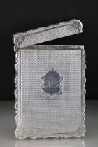 Victorian silver card case, repeating pattern decoration to the case, engraved foliate decoration to