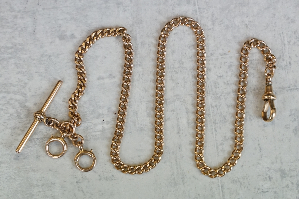 15ct rose gold curb link watch chain with t bar , each link hallmarked, dog clip, and two bolt