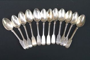 Twelve Victorian silver hallmarked fiddle pattern spoons. Date marks range from 1839 - 1854, most