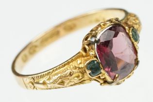 Victorian garnet and emerald 15ct yellow gold ring, the oval mixed cut garnet measuring approx 7x