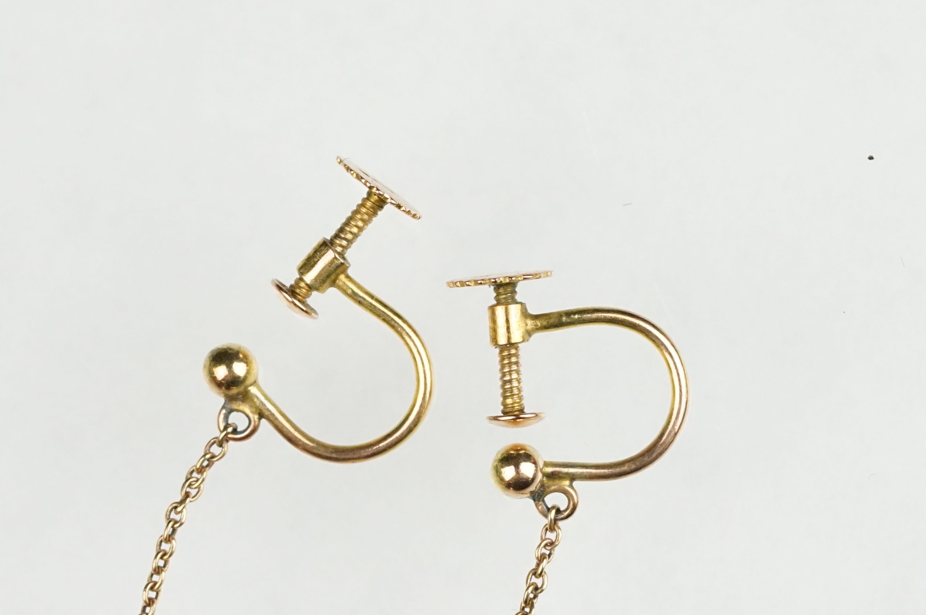 Pair of early 20th century coral 9ct yellow gold drop earrings, the tapered coral with conical - Image 3 of 6