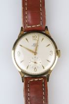 Uno Gents wristwatch, yellow metal case, gilt Arabic and baton numeral markers, engraved