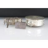 Two silver boxes to include a round silver jewellery box having a moulded rim with engraved