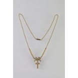 Late 19th / early 20th century diamond and seed pearl unmarked yellow gold pendant necklace, the