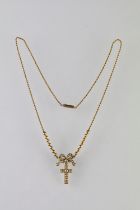 Late 19th / early 20th century diamond and seed pearl unmarked yellow gold pendant necklace, the