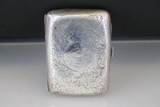 Silver cigarette case, engraved foliate scroll decoration, monogrammed cartouche, gilt lined