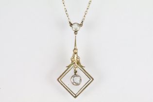 Edwardian aquamarine and seed pearl 9ct yellow gold pendant necklace, the principal round mixed