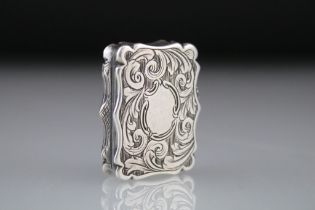 Early Victorian silver vinaigrette, engraved foliate scroll decoration to the hinged lid and body,