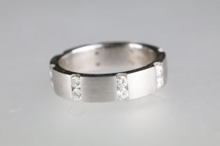 Diamond 18ct white gold eternity ring, sixteen small round brilliant cut diamonds in rows of two,
