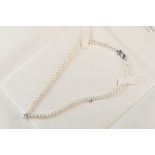 Mikimoto pearl 18ct white gold necklace, white cultured pearls with pink overtones, diameter range