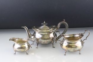 Edwardian silver three piece Bachelors tea service, comprising teapot, twin handled sugar bowl and