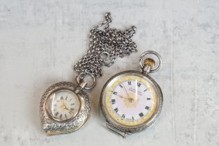 Silver heart shaped pendant fob watch, the silver case with enamelled swallow and forger-me-knot