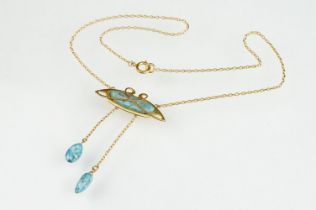 Arts & Crafts simulated turquoise yellow metal pendant necklace, the central simulated stone encased
