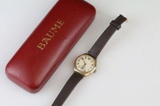 Gents wristwatch, yellow metal case, circular champagne dial, Arabic numerals, poker hands,