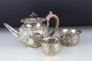 Late Victorian silver three piece Bachelor tea service comprising teapot, sugar bowl and milk jug,