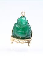 Green agate carved buddha, 9ct gold mounts, pendant attachment, length approx 3cm