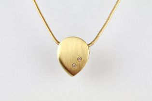 Diamond 18ct yellow gold pendant necklace, two small round brilliant cut diamonds, flush set to matt