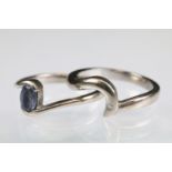 Tanzanite 18ct white gold ring, the oval mixed cut tanzanite measuring approx 5.5 x 4mm, crossover