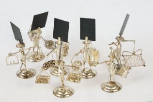 Seven Silver Chinese Figure Menu Holders including Fishermen, Street Traders, etc