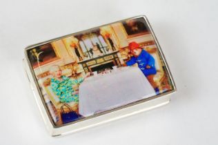 Silver Pill Box with enamel lid depicting Paddington Bear and Queen Elizabeth II taking tes