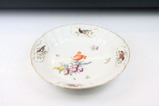 18th Century Meissen deep circular dish with central floral sprays, the moulded border with four